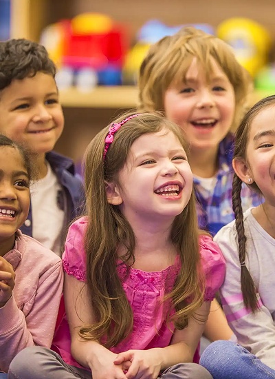 children listening and laughing